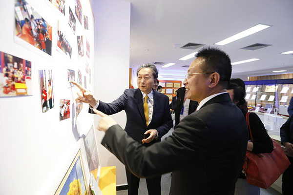 Yukio Hatoyama , the Japan's former Prime Minister visits the exhibition hall